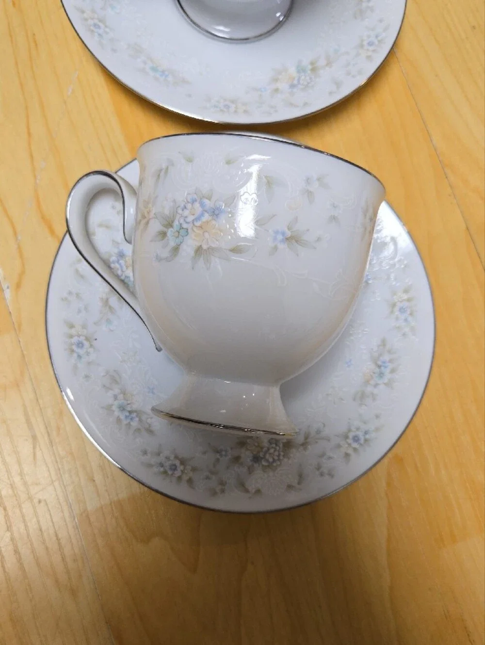 Elegant Noritake, White Floral Teacup and Saucer Set